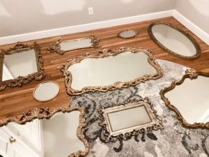 Much like a photograph gallery wall mirrors combine the coverage you are looking to apply but they can create dimensions in small to large spaces adding depth and of course eye catching
